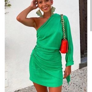 green one-shoulder dress